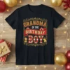 Grandma Of The Birthday Boy text design with circus tent graphics, lion, and elephant on a black t-shirt