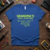 Grandma's Tech Support t-shirt design featuring pixelated text and a circuit board heart graphic with tech icons