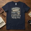 Grandpa Knows Everything If He Doesn't Know He Makes Stuff Up Really Fast quote on a navy t-shirt