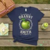 Granny Smith text with a green apple graphic on a navy blue t-shirt