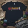 Grantifa Old Women Against Fascists T-Shirt featuring knitting needles, yarn, and a raised fist graphic. Political statement tee
