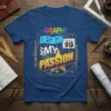 Graphic Design Is My Passion text with colorful typography and star graphic on a blue t-shirt