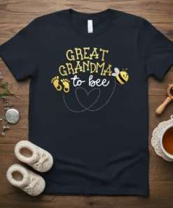 Great Grandma to bee t-shirt with gold glitter text, baby footprints, and a cute bee graphic