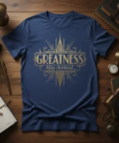 Navy blue t-shirt with gold Art Deco design featuring the text "GREATNESS Has Arrived..."
