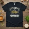 Green Bean Casserole text with a graphic of a steaming casserole dish on a dark t-shirt
