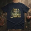 Golf t-shirt design with text "GRIP IT SOFTLY AND STROKE IT SMOOTHLY" and a golf putter graphic