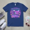 Groovy 11 Years Old Girl birthday t-shirt with neon pink and blue retro text, flowers, and butterflies