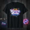 Groovy Baby retro 70s graphic t-shirt with vibrant neon geometric design and palm trees