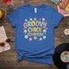 Groovy Chick Chick retro t-shirt design with colorful lettering and floral graphics, perfect for 70s style enthusiasts