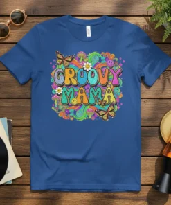 Groovy Mama text in colorful retro font with butterflies and psychedelic patterns, printed on a blue t-shirt