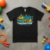 Gross Motor Promoter text in colorful, playful font with stick figures engaged in activities on a black t-shirt