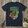Grow A Garden T-Shirt featuring a pixelated raccoon, tomatoes, bell pepper, asparagus, and a shovel