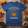 Growing A Little Pumpkin text with a pumpkin graphic on a royal blue t-shirt, perfect for pregnancy announcements