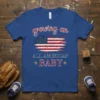 Growing an All American Baby t-shirt with a distressed American flag graphic and patriotic text