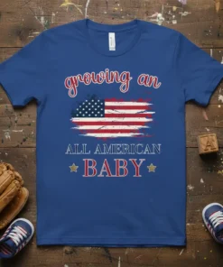 Growing an All American Baby t-shirt with a distressed American flag graphic and patriotic text