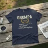 Navy t-shirt with "GRUMPA noun: like a regular grandpa only grumpier." text in distressed gold and white lettering