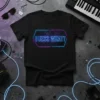 Black t-shirt with "Guess What?" in neon blue and pink geometric design, featuring circuit board patterns