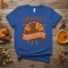 Guess What Turkey Butt funny Thanksgiving t-shirt design with a cartoon turkey and colorful feathers