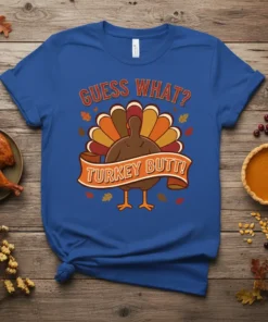 Guess What Turkey Butt funny Thanksgiving t-shirt design with a cartoon turkey and colorful feathers