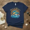 Gulf of Mexico t-shirt design with leaping dolphins, ocean waves, and a sunburst graphic