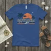 Gulf Of Mexico SINCE 1872 text with retro sunset, palm trees, and ocean wave graphic on a blue t-shirt