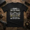 Black t-shirt with white text quote "Guns Are Like Boobs Even The Small Ones Are Fun To Play With" and