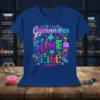 Gymnastics + Slime = Life text design with colorful neon graphics and gymnastics silhouettes on a blue t-shirt