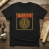 Black t-shirt with "HABESHA" in gold and red, featuring a circular golden design with a lion and cross symbols