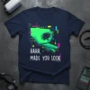T-shirt with "HAHA, MADE YOU LOOK" text and a green hand making the circle game symbol, set against a glitch