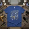 Hair Fairy text design with a silhouette of a fairy and swirling golden hair motifs, on a blue t-shirt