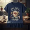 Navy t-shirt with "Half Coffee Half Half Nurse Nurse" text, a coffee cup, syringe, and caduceus symbol