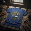Blue t-shirt with "Hands Off! It's Mine" text in gold steampunk style, gears, and claw marks