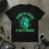 Hang in There It Gets Worse T-Shirt featuring a neon green anatomical heart and circuit board design