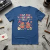 Hap-Pee Valentine's Day t-shirt design featuring two cartoon kidneys holding balloons and a gift, with colorful text