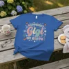 Happiest Gigi On Earth t-shirt with colorful typography, butterflies, and floral illustrations
