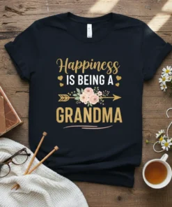 Happiness is Being a Grandma quote with floral arrow design on a dark t-shirt
