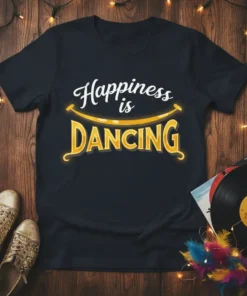 Happiness is Dancing quote on a black t-shirt with stylized text and a smiling curve graphic