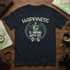 Happiness Is Hiking With My Dog quote t-shirt design with hiker and dog in mountains, surrounded by wreath and paw