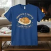 Blue t-shirt featuring a cute sleeping tabby cat on a pillow with "Happiness is napping with my cat" text