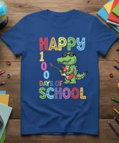 Happy 100 Days of School text with a green alligator playing a red electric guitar, on a blue t-shirt