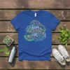 Happy Earth Day t-shirt with a circular word cloud design in green, blue, and yellow text, featuring words like compost