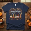 Happy Fall Y'all t-shirt design with five cute gnomes, autumn leaves, and tree branches
