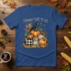 Happy Fall Y'all t-shirt with a crow on pumpkins, featuring autumn leaves and corn stalks