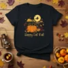 Happy Fall y'all t-shirt design with a pumpkin, witch flying, moon, and autumn leaves