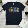 Happy Fri-Yay text design with colorful letters, pencils, books, and a lightbulb on a navy t-shirt