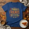 Happy FRIENDS giving text with fall leaves and wheat graphic on a blue t-shirt