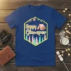 Happy Glamper text with a tent and mountains graphic on a navy blue t-shirt, perfect for camping lovers