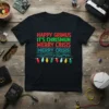 Happy Grimus It's Chrismun Merry Crisis Merry Crisis text design with colorful Christmas lights graphic on black t-shirt