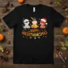 Happy Hallothanksmas text with cute mummy, pilgrim, and Santa characters on a black t-shirt