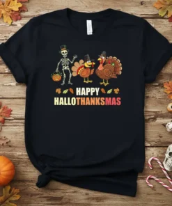 Happy Hallothanksmas text with skeleton and turkeys graphic on a black t-shirt, perfect for holiday mashup celebrations